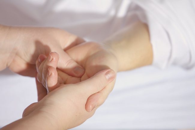 treatment-finger-keep-hand-161477 person holding hand